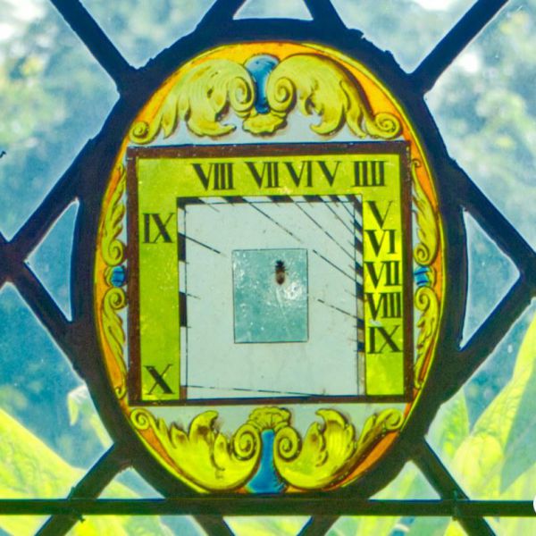 Stained Glass Sundial Window At Berkeley Castle