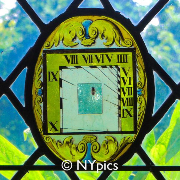 Stained Glass Sundial Window At Berkeley Castle