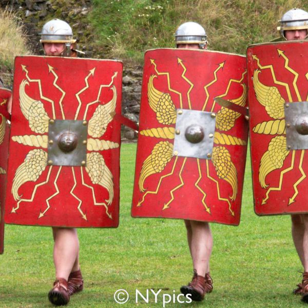 Roman Legionary Soldiers Behind Their Shields